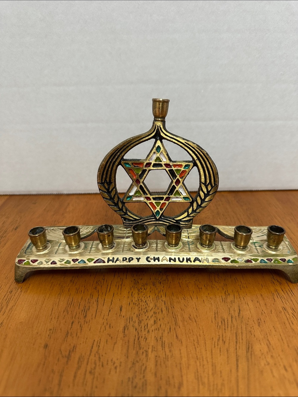 Vintage brass menorah with colorful enamel. 9 candle holder. Star of David